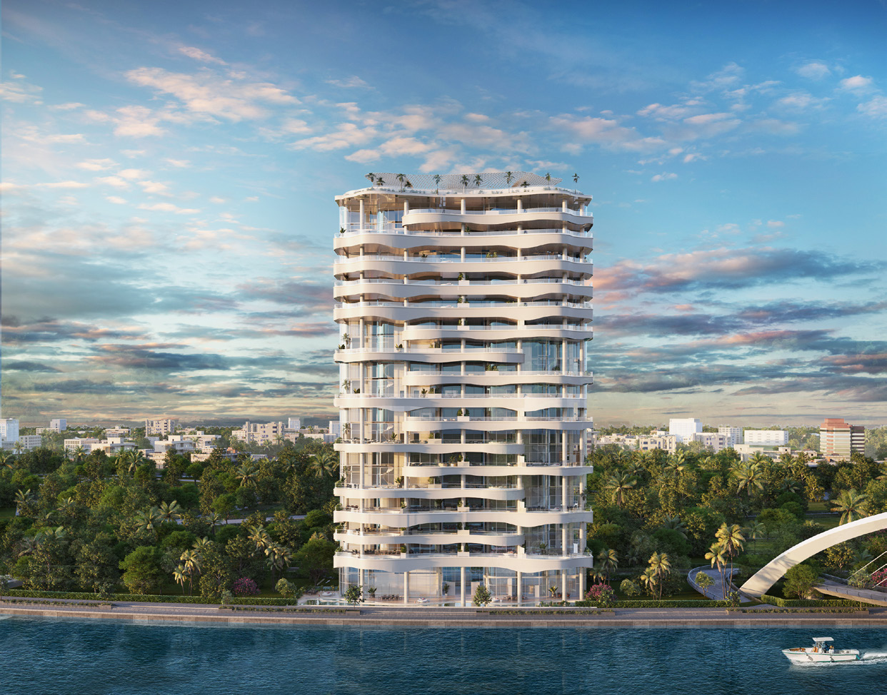 One Canal tower at sunset above the trees and the water